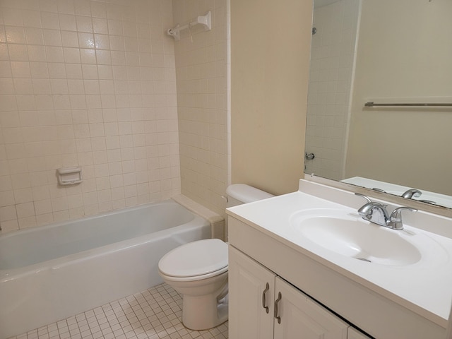 full bathroom featuring tile patterned flooring, toilet, vanity, and bathing tub / shower combination