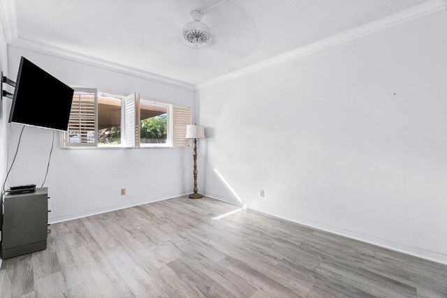 unfurnished living room with ceiling fan, crown molding, a textured ceiling, and light hardwood / wood-style floors