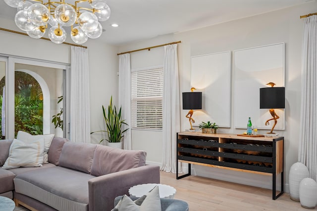 living room with light hardwood / wood-style flooring