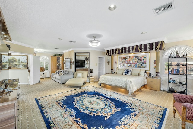 bedroom featuring crown molding