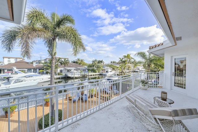 balcony featuring a water view