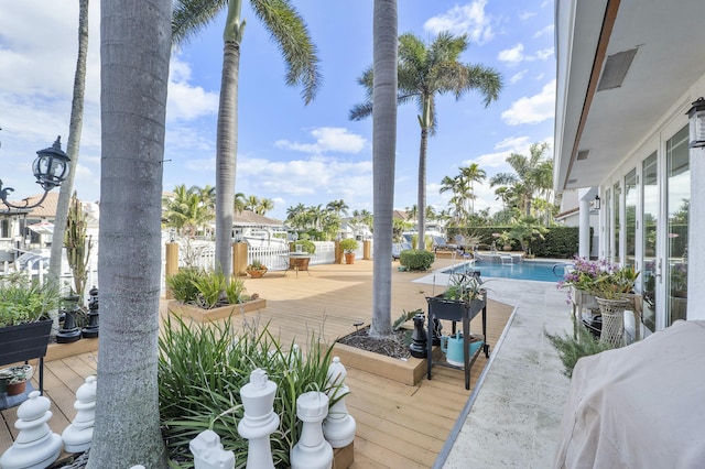 view of patio featuring a swimming pool side deck