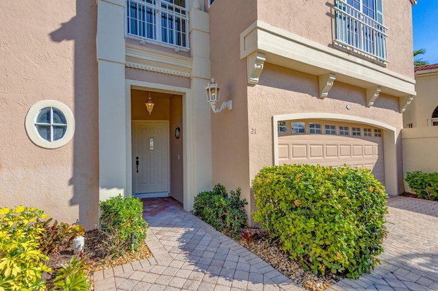 property entrance with a garage