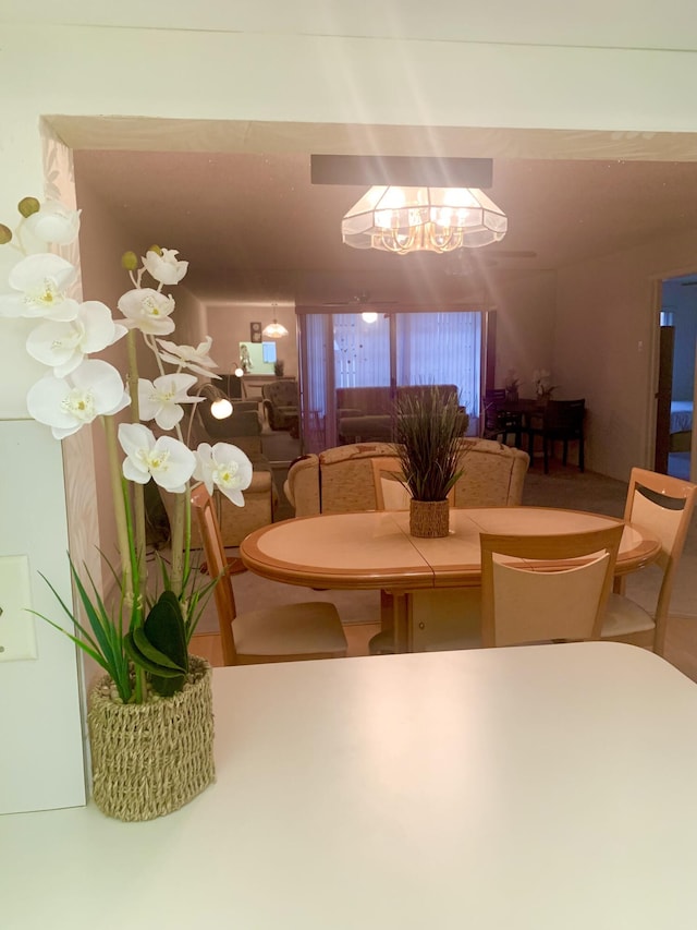 dining area with a notable chandelier