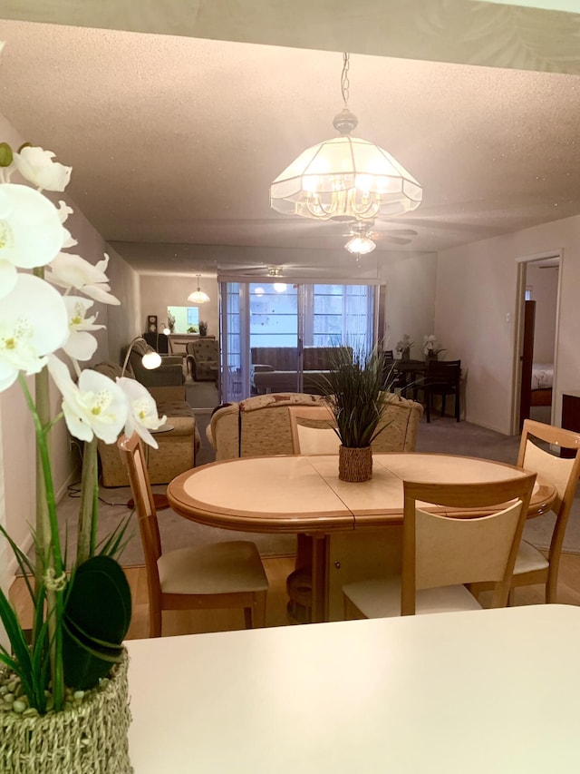 dining room featuring a chandelier