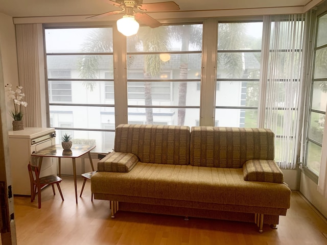 sunroom / solarium with ceiling fan