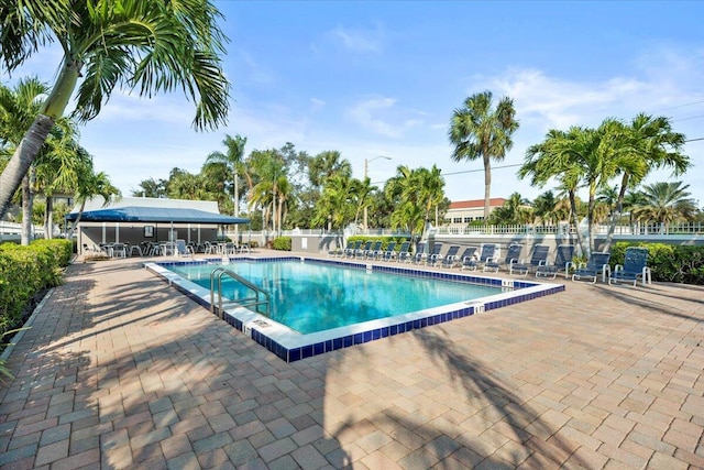 view of swimming pool featuring a patio