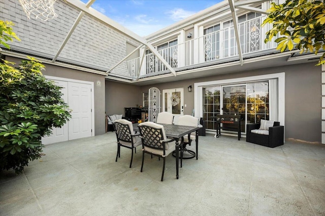 view of patio / terrace with a balcony