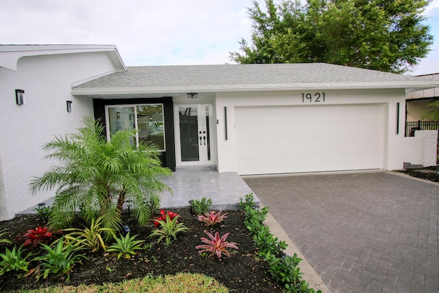 view of front of home with a garage