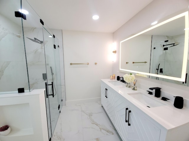 bathroom with an enclosed shower and vanity