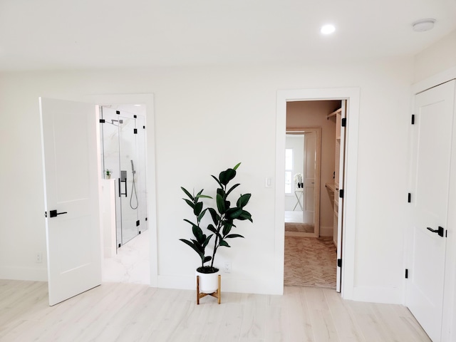 unfurnished room featuring light wood-type flooring