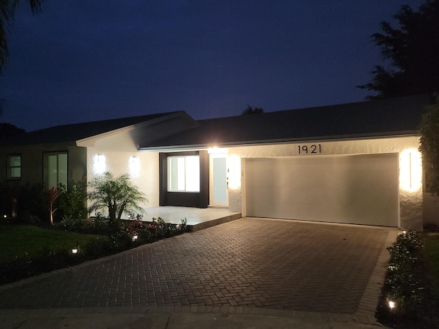 view of front of home featuring a garage