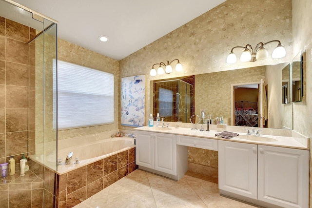 bathroom with vanity, shower with separate bathtub, and tile patterned floors