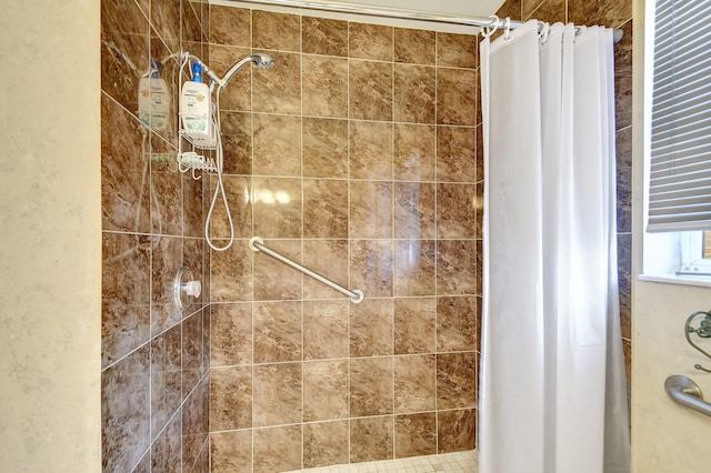 bathroom with a shower with curtain