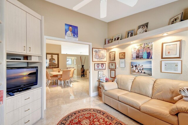 living room featuring ceiling fan