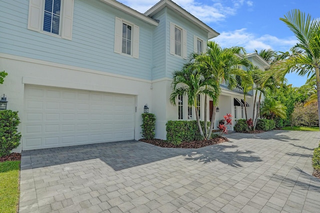 view of front of property with a garage