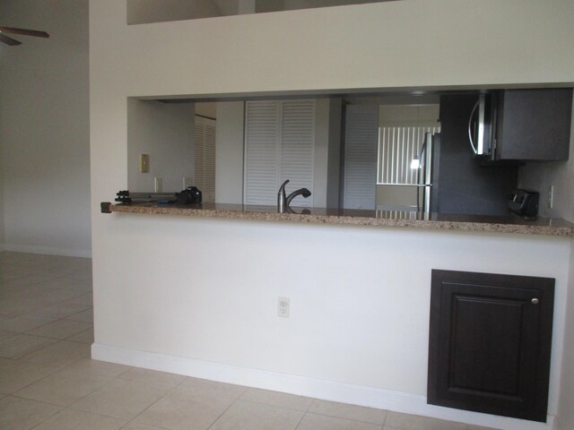 full bathroom featuring combined bath / shower with glass door, toilet, tile patterned floors, and vanity