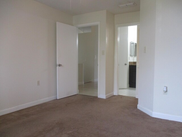 kitchen with a breakfast bar, tile patterned floors, and a wealth of natural light