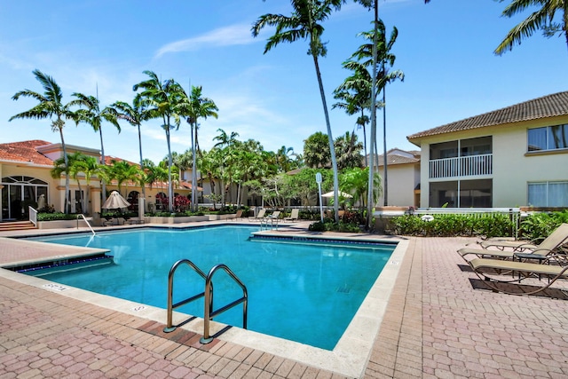 pool featuring a patio area