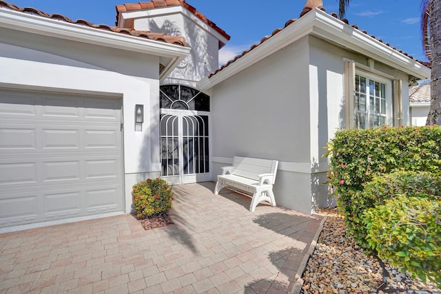 exterior space with a garage