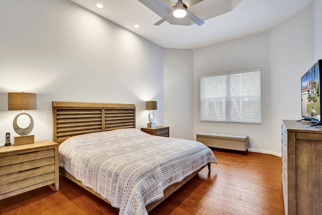 bedroom with ceiling fan and wood-type flooring