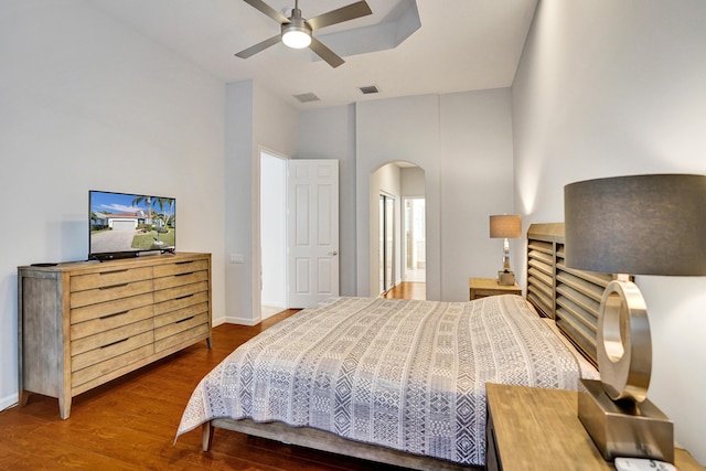 bedroom with ceiling fan and hardwood / wood-style floors