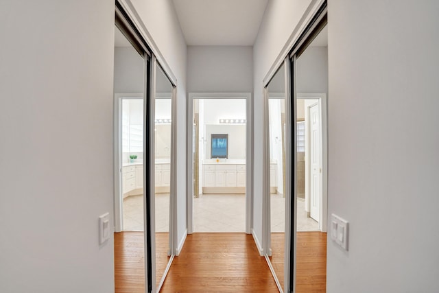 hallway featuring hardwood / wood-style floors