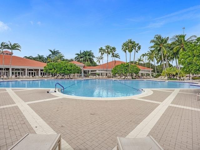 view of swimming pool featuring a patio