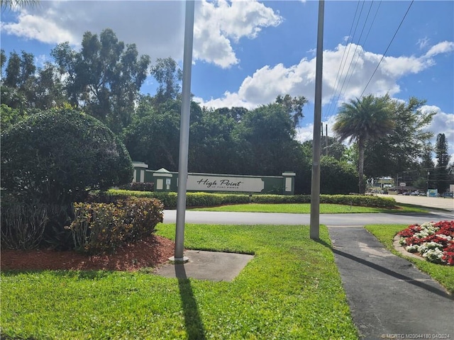 1235 S Lakes End Dr Unit 0, Fort Pierce, FL 34982 - community / neighborhood sign with a lawn
