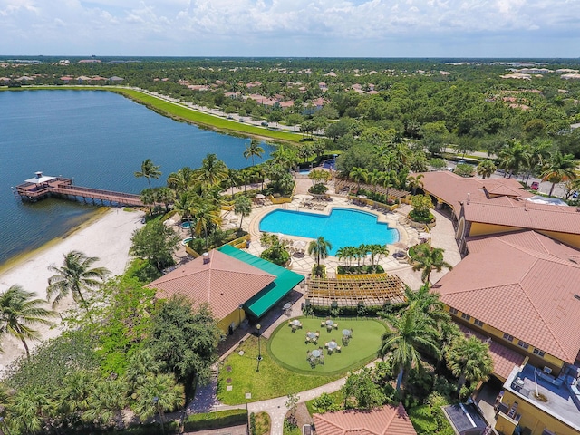 birds eye view of property with a water view