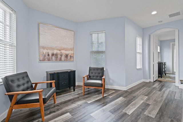 living area featuring dark wood-type flooring