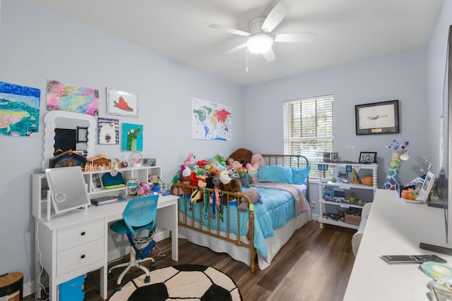 bedroom with ceiling fan and dark hardwood / wood-style flooring