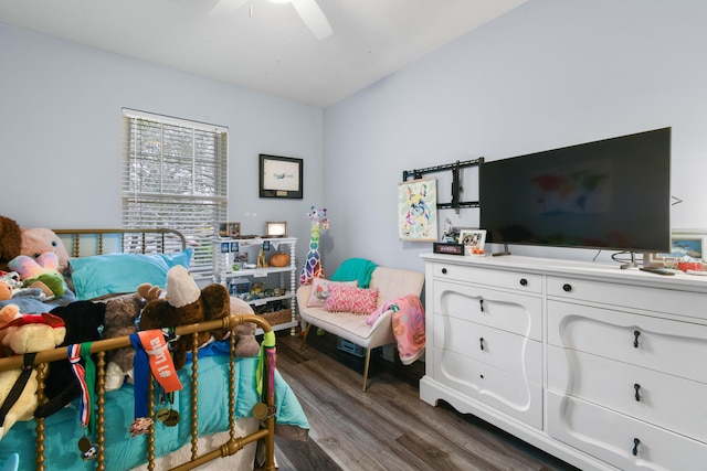 bedroom with dark wood-type flooring and ceiling fan