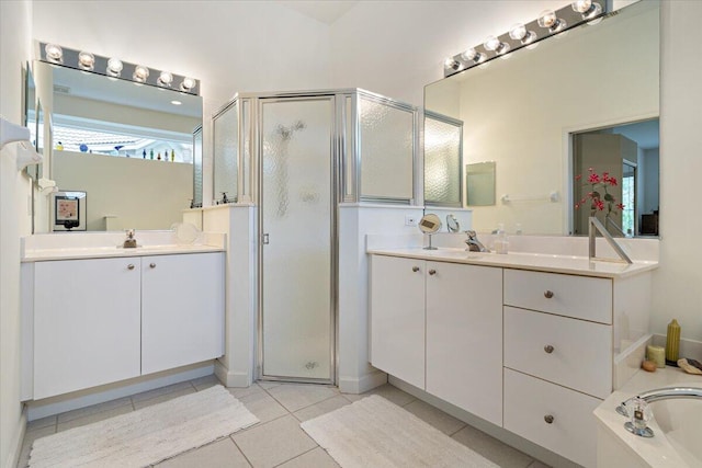 bathroom with shower with separate bathtub, tile patterned floors, and vanity