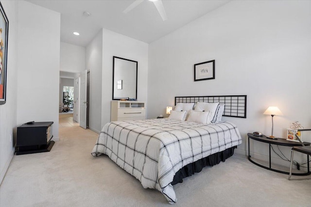 carpeted bedroom with ceiling fan