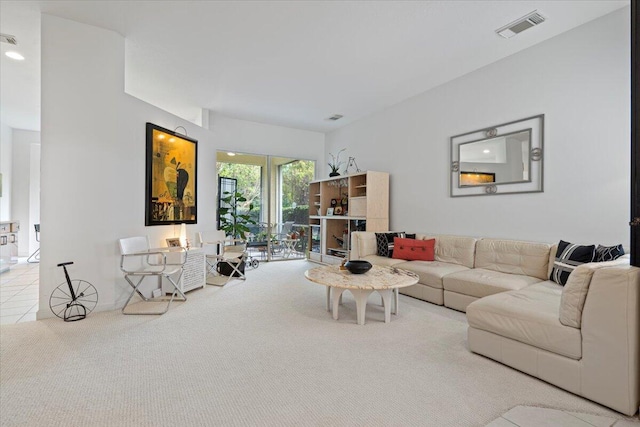 living room featuring light carpet