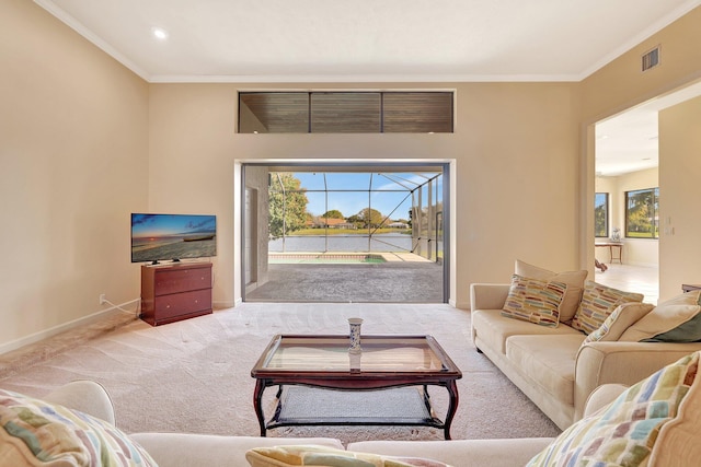 carpeted living room featuring crown molding