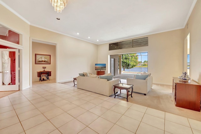 tiled living room with an inviting chandelier and ornamental molding