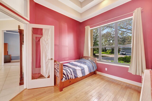 bedroom with light hardwood / wood-style floors