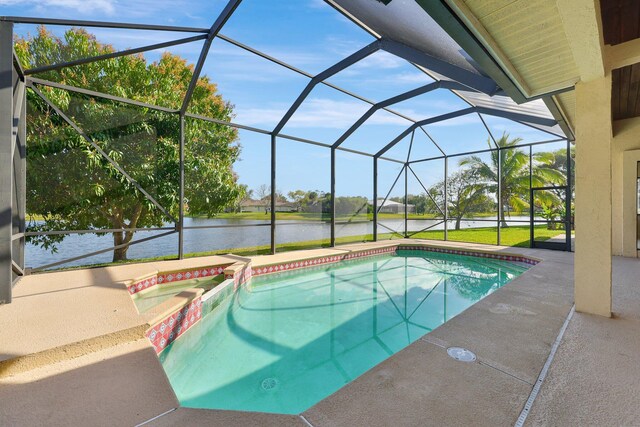 view of swimming pool featuring a water view, an in ground hot tub, a lanai, and a patio area