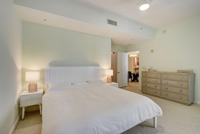 bedroom featuring ceiling fan and light colored carpet