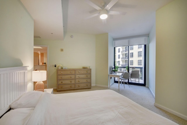 bedroom featuring light carpet and ceiling fan