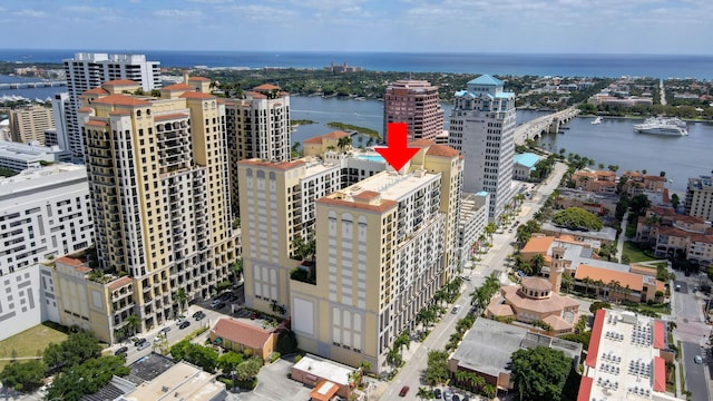 birds eye view of property with a water view