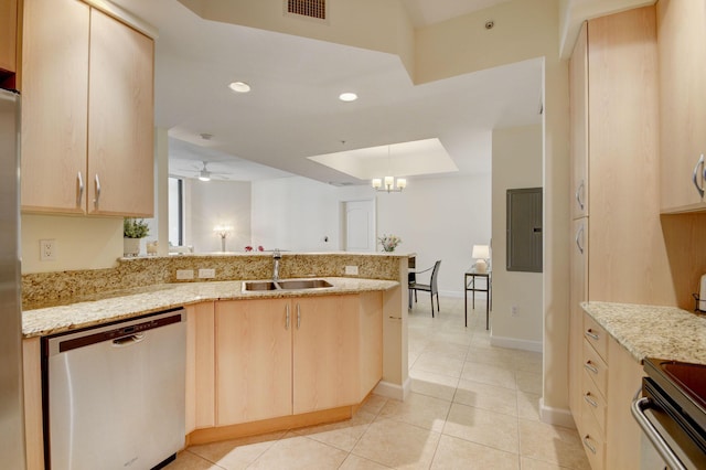 kitchen featuring ceiling fan with notable chandelier, light stone countertops, dishwasher, light brown cabinetry, and sink