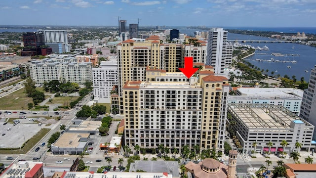 birds eye view of property with a water view