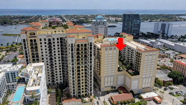 birds eye view of property featuring a water view