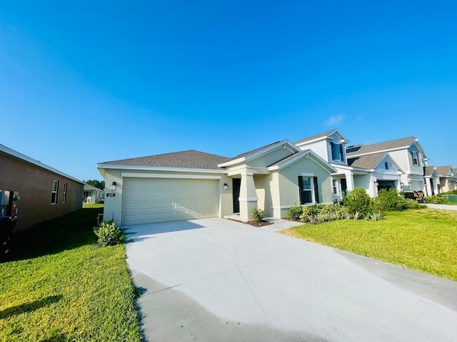 view of front of property with a front lawn and a garage