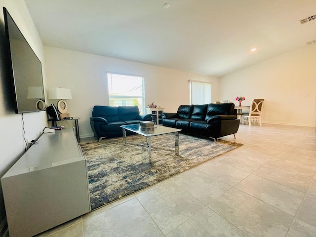 living room with lofted ceiling