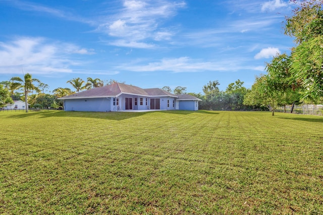 view of yard with a garage