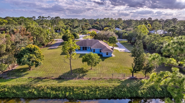 bird's eye view with a water view and a rural view